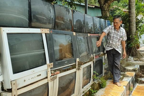 can canh: ngam hang rao bang 40 chiec tv cua lao nong o kien giang - 4