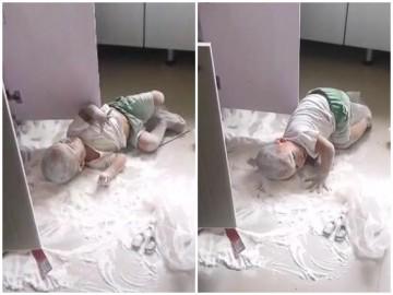 Nghe tiếng động, mẹ vội chạy vào phòng bếp thì thấy con trai nằm lăn lóc trên sàn nhà