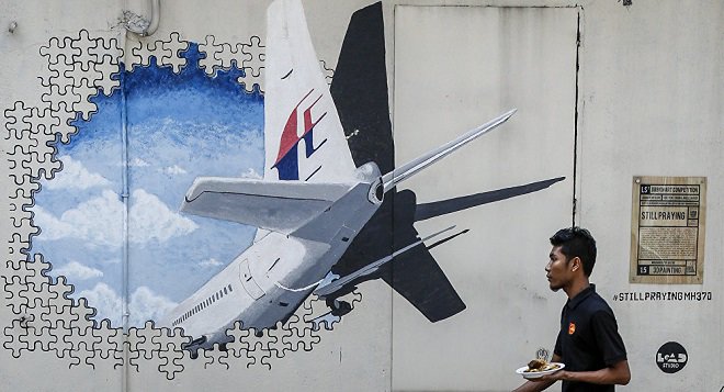 Phát hiện mới gây sốc về người điều khiển máy bay MH370 phút cuối và sự bất thường đáng ngờ - 1