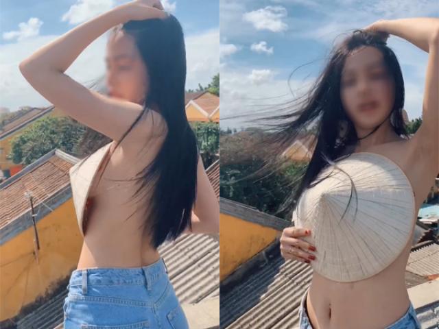 Cô gái không mặc gì che nửa trên, chỉ dùng nón lá che hờ ngực khiến dân tình nóng mắt
