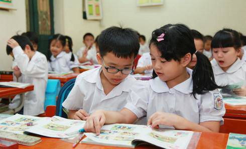 hoc sinh tieu hoc chinh thuc duoc mien dong hoc phi bat dau tu ngay 1/7 - 1
