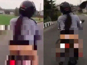 Tin tức - Mặc váy ngắn bằng gang tay đi xe máy, cô gái 2 lần để lộ nội y phản cảm