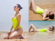 Giải trí - Loạt ảnh mặc áo tắm khoe ngực căng tròn trên bờ biển của Hoa hậu Kỳ Duyên
