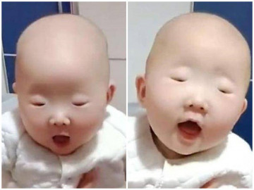 Mẹ ăn nho mong con mắt to rõ mí, bé chào đời khiến cả nhà câm nín