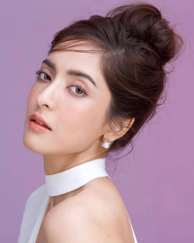 Pinky Savika bị tình nghi là mắt xích quan trọng của đường dây lừa đảo.