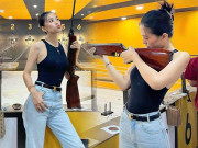 Thời trang - Tiểu Vy ấn tượng với hình ảnh đi bắn súng, diện áo ôm body