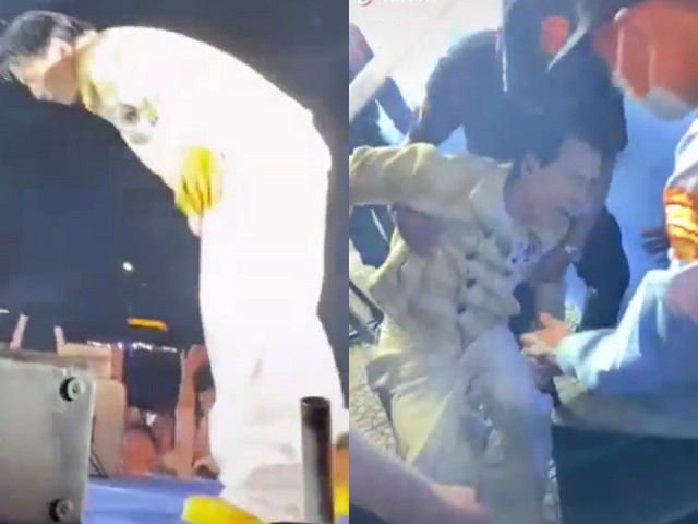 Karik ngã từ trên sân khấu cao khoảng 1m6 xuống đất