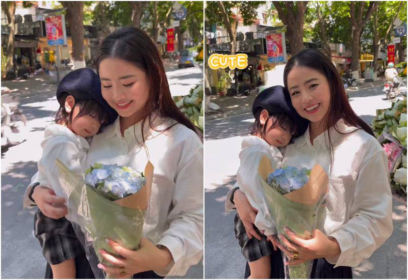 Những ngày vừa qua, đoạn video hot mom Nam Thương bế con đứng mua hoa và chụp ảnh trên phố Phan Đình Phùng ở Hà Nội gây sốt mạng xã hội. Thậm chí những người đi đường cũng ngoái lại nhìn hai mẹ con.
