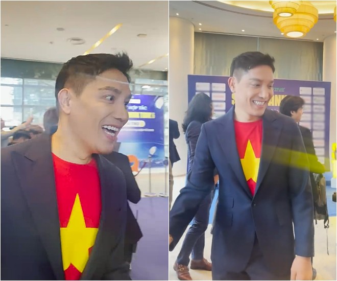 Anh xuất hiện với màu áo cờ đỏ sao vàng và nụ cười tươi tắn.