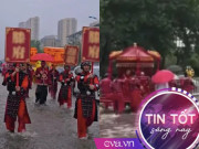 Tin tức - Đám cưới ngày mưa bão, chú rể xắn quần lội nước, cô dâu ngồi kiệu 8 người khiêng