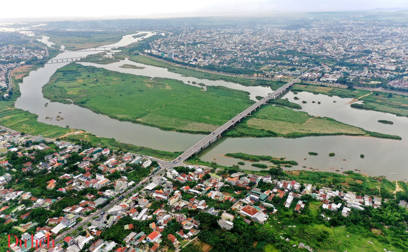 Scenic river flowing through a lush green landscape