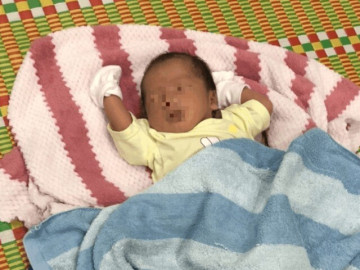 Cháu bé sơ sinh bị bỏ rơi trước cổng chùa cùng bức thư của người mẹ