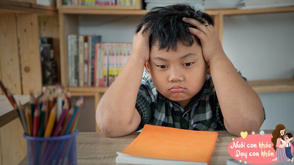 A child feeling stressed while studying