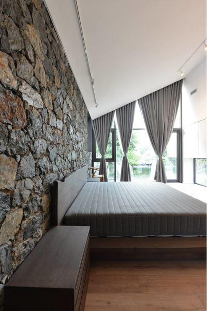 Phòng ngủ thiết kế đơn giản, nhã nhặn. Ảnh: Okoncept