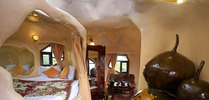 Các cành cây bằng xi măng được thiết kế thành cây cầu xoắn để mọi người có thể di chuyển qua lại giữa các ngôi nhà. Ảnh: Crazyhouse