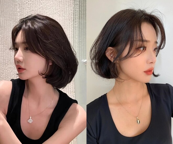 Tóc ngắn chạm cằm uốn cụp ôm sát giúp gương mặt trông thon gọn và thanh thoát hơn.