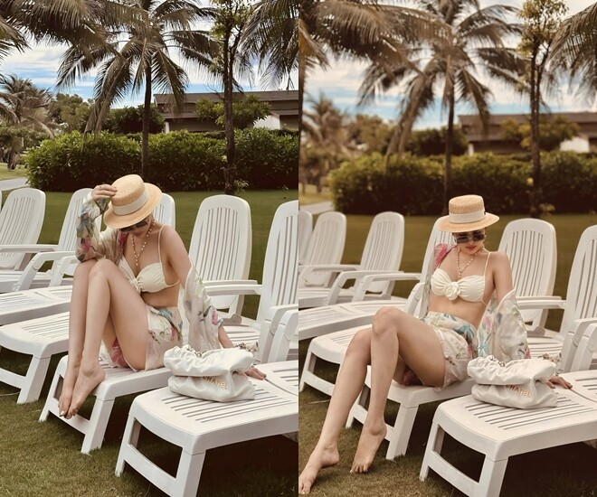 Phanh Lee mang đến một hình ảnh thời thượng và đầy cuốn hút trong set đồ đi biển với tông trắng là chủ đạo.