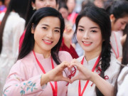 Giải trí - Danh tính và sự thật về cặp "chị em sinh đôi" xinh đẹp rạng ngời trong dàn nghệ sĩ diễu hành A80