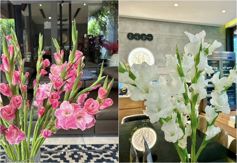 Trên bàn ăn, bình hoa lay ơn tinh khôi, thanh thoát, cắm cao trong lọ thủy tinh, làm dịu cả căn bếp hiện đại.
