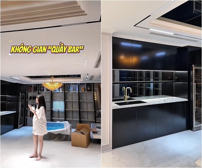 Khu quầy bar của gia đình, một mặt được thiết kế một kệ trưng bày, một mặt là quầy bar thực thụ, cô sẽ bày những ly, cốc... tại đây.