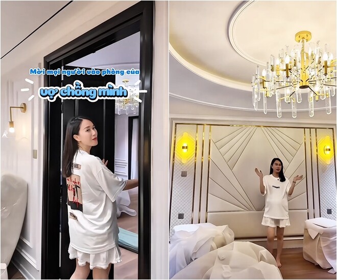 Dẫn vào phòng của vợ chồng mình, nữ MC chia sẻ, vách đầu giường đã làm xong và treo đèn đầu giường, đồng thời có một đèn chùm rất đẹp trong phòng.