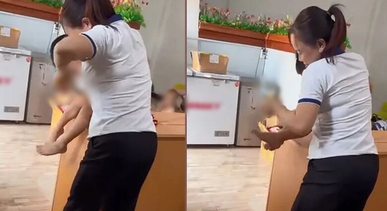Hình ảnh người phụ nữ một tay giữ, một tay cầm kéo đe dọa trẻ. Ảnh: Cắt từ clip