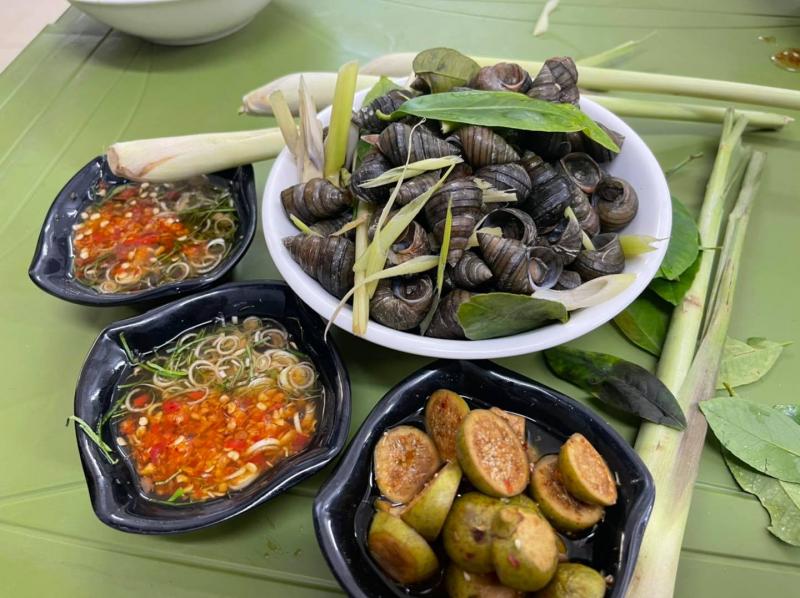 Bạn nhất định phải thưởng thức ốc hồ Tây khi tới Hà Nội