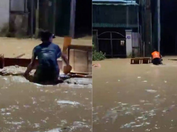 VIDEO: Nước lũ cuồn cuộn cuốn trôi nhiều nhà cửa, tài sản của người dân trong đêm