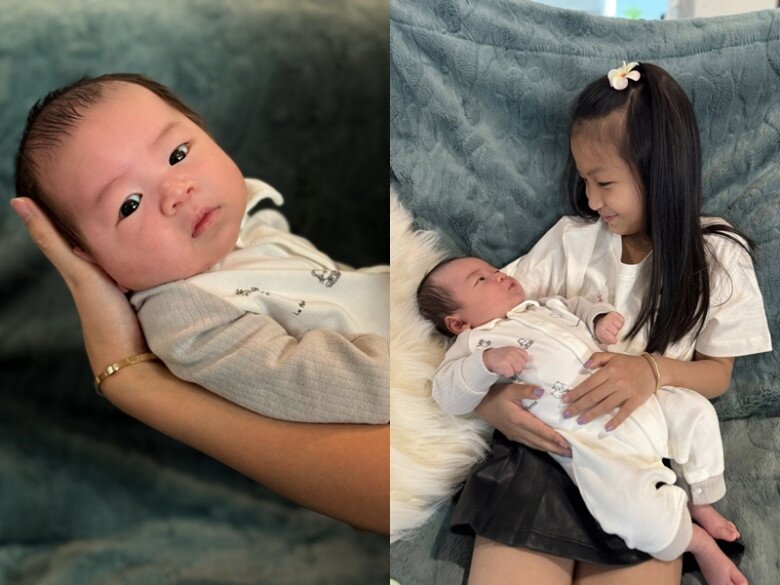 Cô bé Phoebe rất cưng chiều em trai.