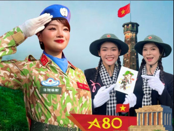 Nữ Thiếu úy biến tài lẻ thành món quà tặng đồng đội, hé lộ chuyện phía sau bức ảnh trùm kín từ đầu đến chân