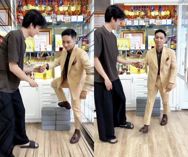 Sự thật là để có thể chạm tới kệ huy chương, Phan Hiển phải đứng trên 4 chiếc đệm.