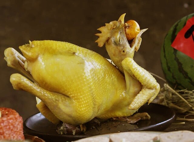 Perfectly boiled chicken with golden crispy skin