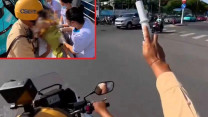 Đang mở đường cho sản phụ thì em bé chào đời trên taxi, CSGT đổi hướng trong tích tắc cứu hai mẹ con