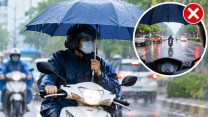 Dùng ô khi đi xe máy, có thể bị phạt đến 1 triệu đồng