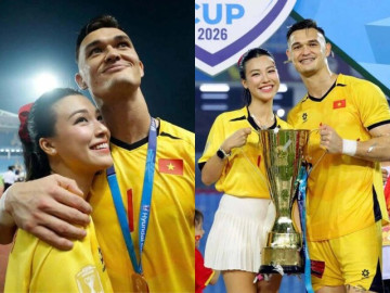 Thủ môn Lê Giang Patrik ôm MC Hoàng Oanh ăn mừng Việt Nam chiến thắng