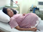 Bà bầu - Sản phụ vừa sinh đôi cặp long phụng, bác sĩ chuẩn bị khâu vết mổ thì ngỡ ngàng: Vẫn còn một em bé nữa!