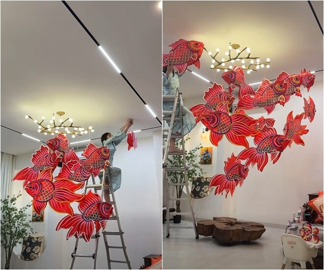 Góc trần nhà khu vực bàn ăn được biến tấu ấn tượng khi treo vô số lồng đèn truyền thống đủ kiểu dáng trên nhánh cây gỗ nghệ thuật.
