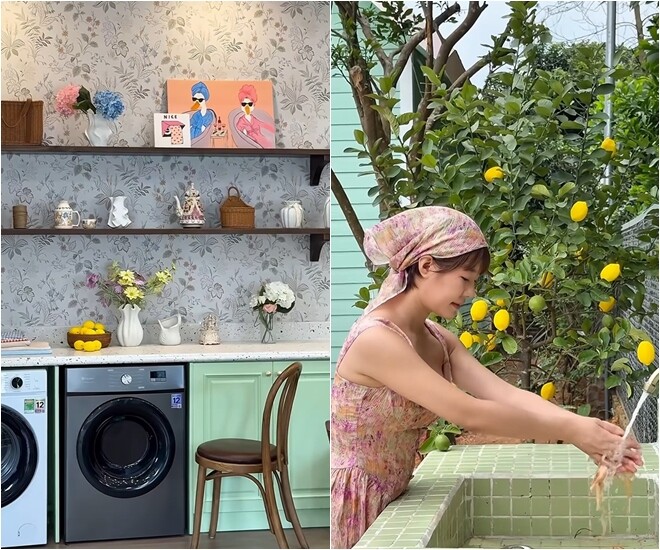 Góc giặt sấy nhỏ xinh được dán giấy tường hoa nhã nhặn kết hợp kệ gỗ mộc mạc. Phía ngoài sân, khu vực bồn rửa được ốp gạch mosaic màu xanh lá dịu mắt bên gốc chanh trĩu quả.