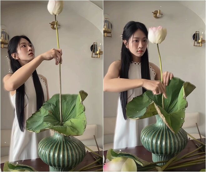 Nữ diễn viên bắt đầu bước định hình bằng việc đặt một chiếc lá sen lớn, xòe rộng ngay sát miệng bình để làm bệ đỡ vững chắc cho các cành hoa tiếp theo. Sau đó, cô cẩn thận chọn bông sen đầu tiên có dáng thẳng đứng, tôn lên chiều cao thanh thoát làm điểm tâm trung tâm cho tác phẩm.