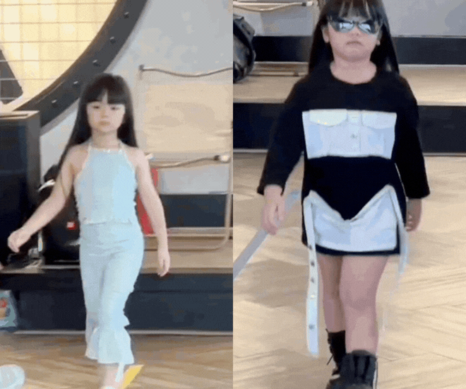 Thần thái catwalk trái ngược của cặp song sinh nhà Vân Trang.