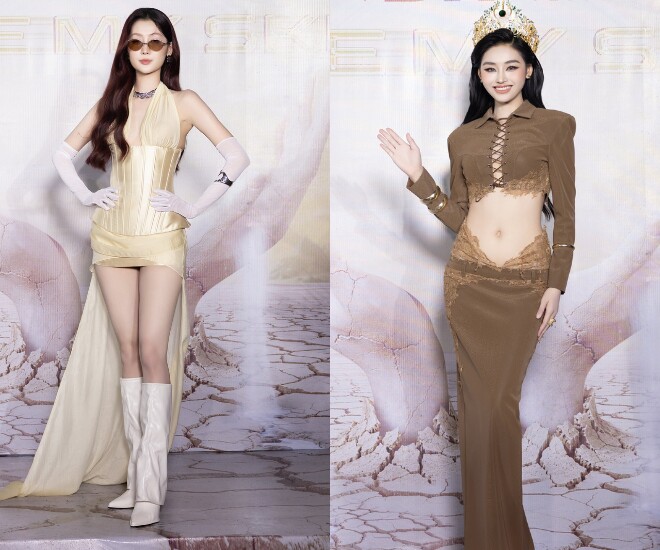 Hoa hậu Quế Anh chơi lớn với tạo hình fashionista khi diện mini dress corset tông champagne, phối boots cao cổ, găng tay và kính râm, khoe triệt để đôi chân dài. Trái ngược hoàn toàn, đương kim Hoa hậu Yến Nhi chọn thiết kế nâu ôm sát, cắt xẻ táo bạo, phô diễn vòng eo săn chắc và thần thái sắc sảo.