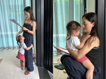 Cảnh làm mẹ hiện tại của DV Lan Phương sau ly hôn chồng Tây, vừa đọc kịch bản phim vừa bế con gái lai 27 tháng tuổi
