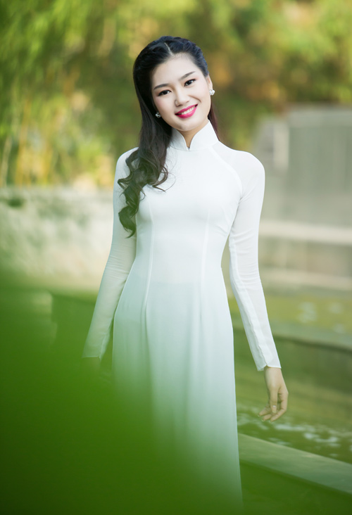Top 5 HHVN 2014 đẹp dịu dàng trong tà áo dài - 13