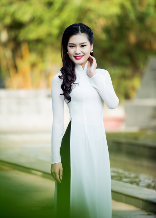 Top 5 HHVN 2014 đẹp dịu dàng trong tà áo dài - 14