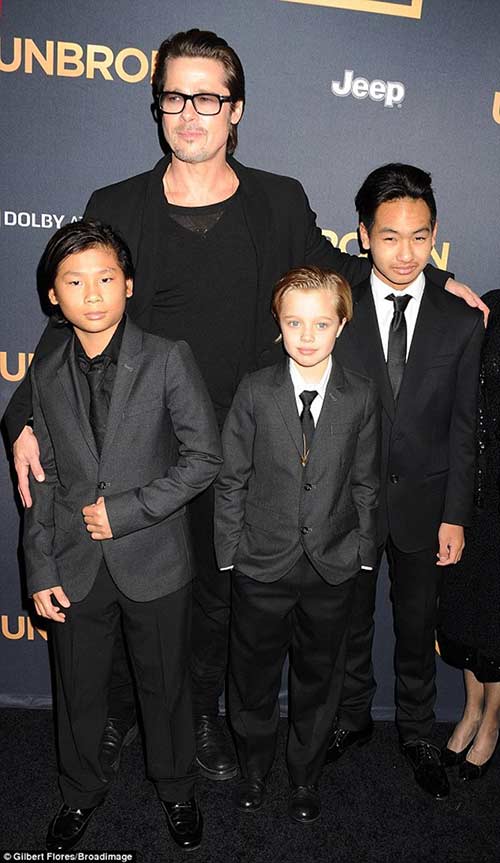 Vẻ nam tính khó tin của con gái Angelina Jolie và Brad Pitt - 1