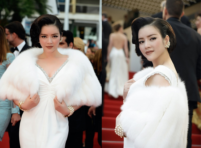 Lý Nhã Kỳ tham gia LHP Cannes lần thứ 68 trong một thiết kế trắng muốt đệm lông quanh vai của Elcom Furs.
