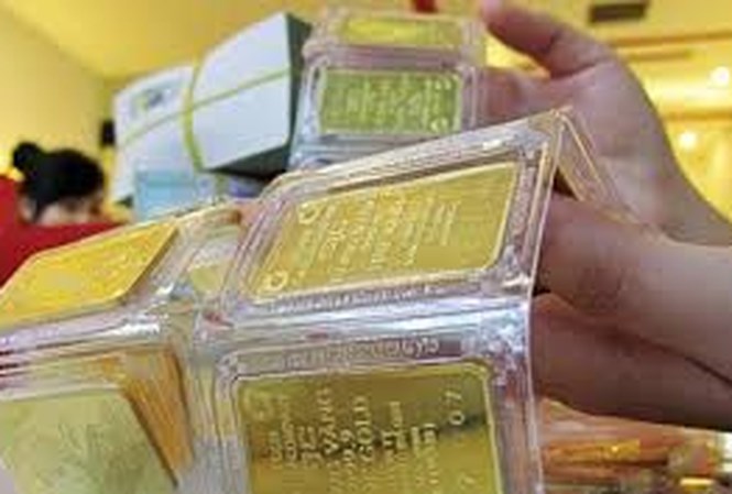 Giá vàng hôm nay 5/10: Lại lao dốc ngược thế giới - 1