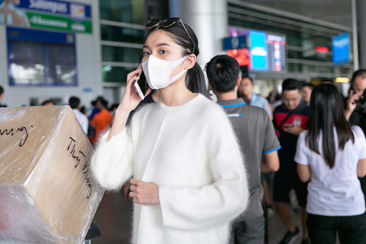 Á hậu Thuỳ Dung bịt khẩu trang kín mít, âm thầm về nước sau Miss International - 6