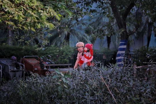 Ảnh: Người Hà Nội co ro trong ngày rét buốt nhất từ đầu mùa đông - 17