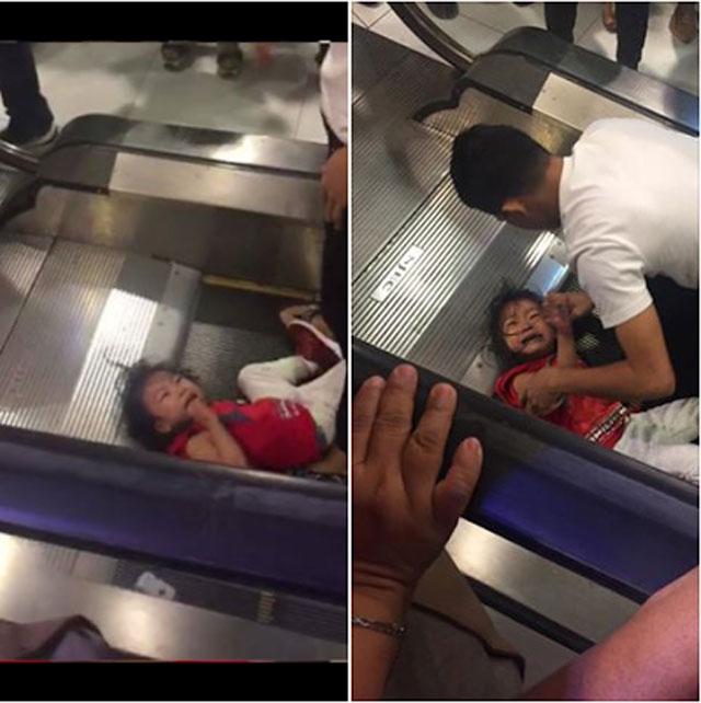 Bé gái bị kẹt tóc ở thang cuốn gào khóc thảm thiết khiến ai xem cũng rùng mình - 1